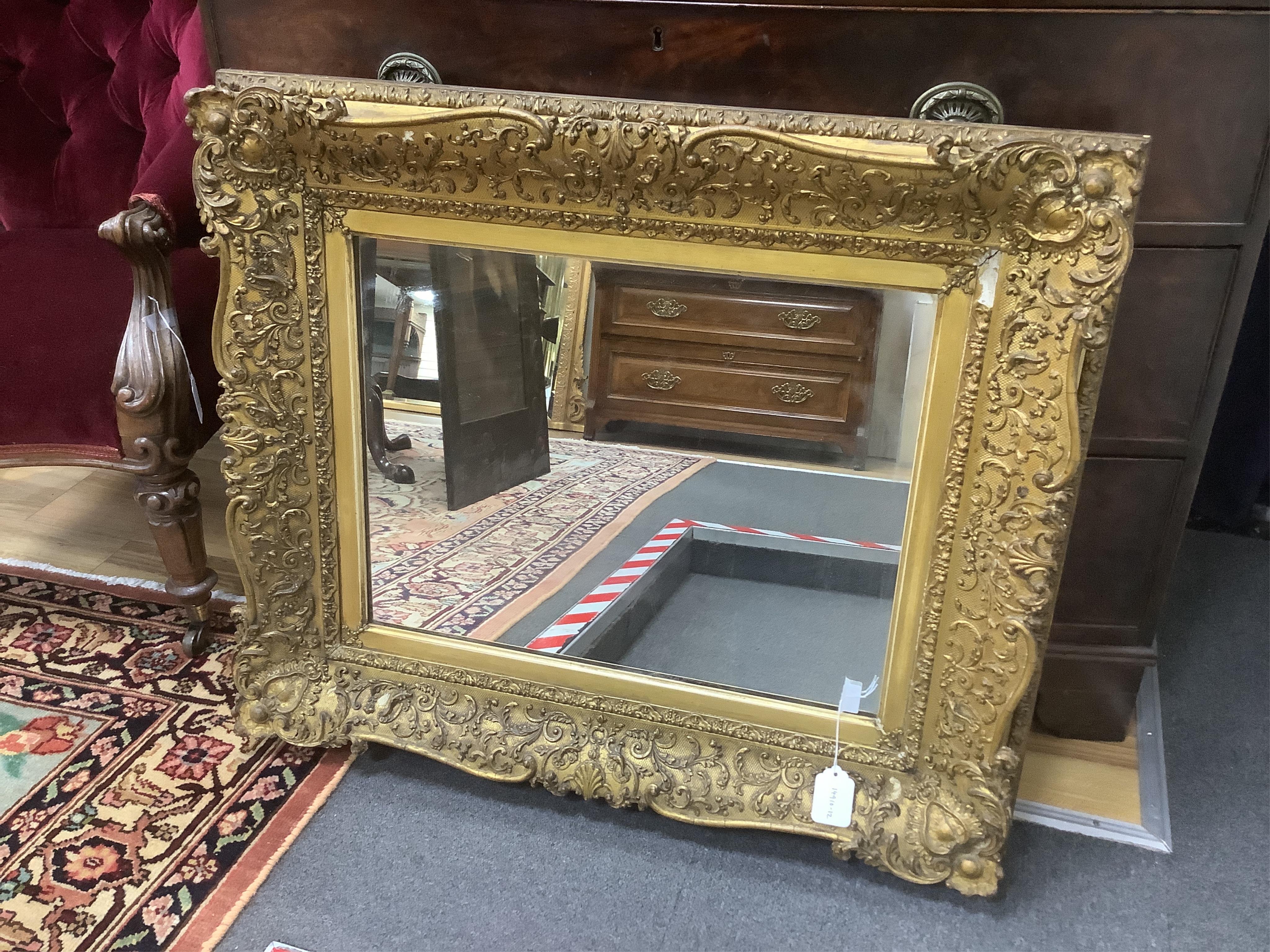 A Victorian giltwood and composition rectangular wall mirror, width 83cm, height 70cm. Condition - fair